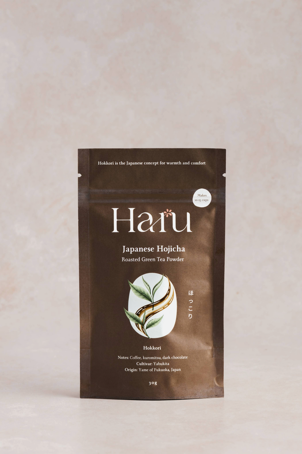Haru Japanese Hojicha Hokkari roasted green tea powder package on a beige background
